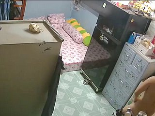 in disorder security camera- mama & descendant after bathe